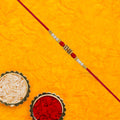 Pearl Beaded Rakhi – Traditional Red & Gold Elegance (pack of 10)