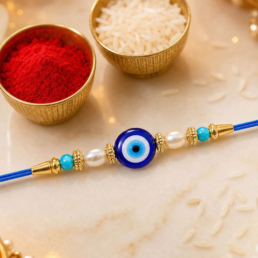 Blue Rakhi – Elegant Stone & Pearl Design for Brother