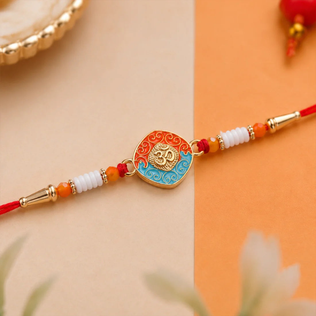 OM Symbol Rakhi – Traditional Style with Modern Elegance