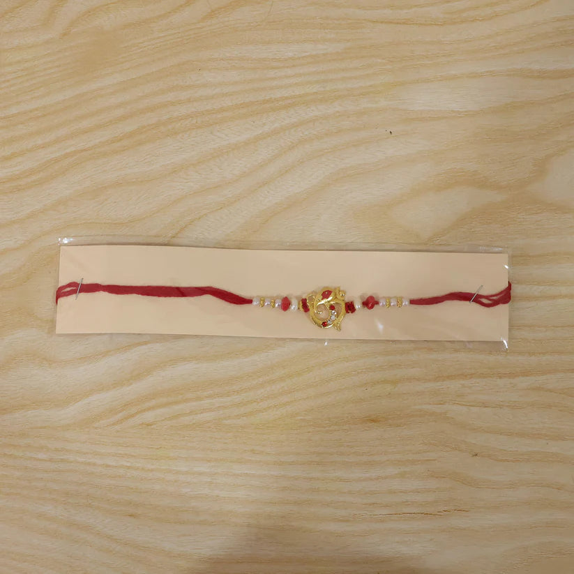 Traditional Rakhi with Red Beads and Pearl Dotted Thread – Elegant Festive Design (pack of 6)