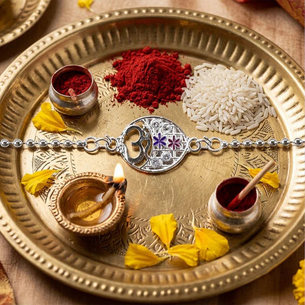 Om Symbol Rakhi – Elegant Floral Design for Brothers and Sisters (pack of 10)